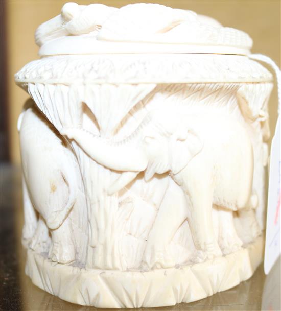 1930s Indian ivory tusk box and cover, all-over carved with elephants